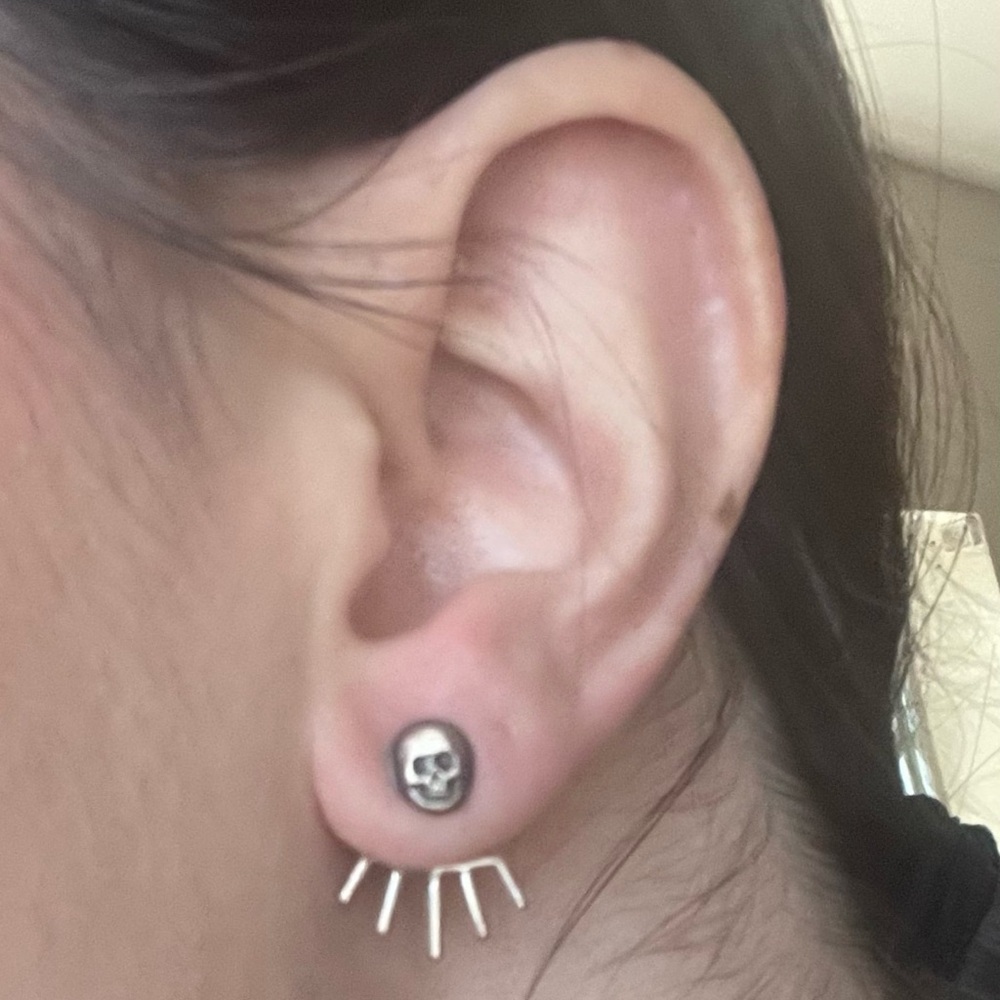 Sterling silver skull earrings jacket sunbeam behind ear artisan made